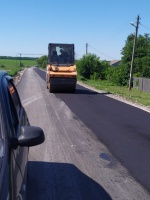 Продолжается ремонт асфальтобетонного покрытия дороги на ул. Заречная с. Александровка